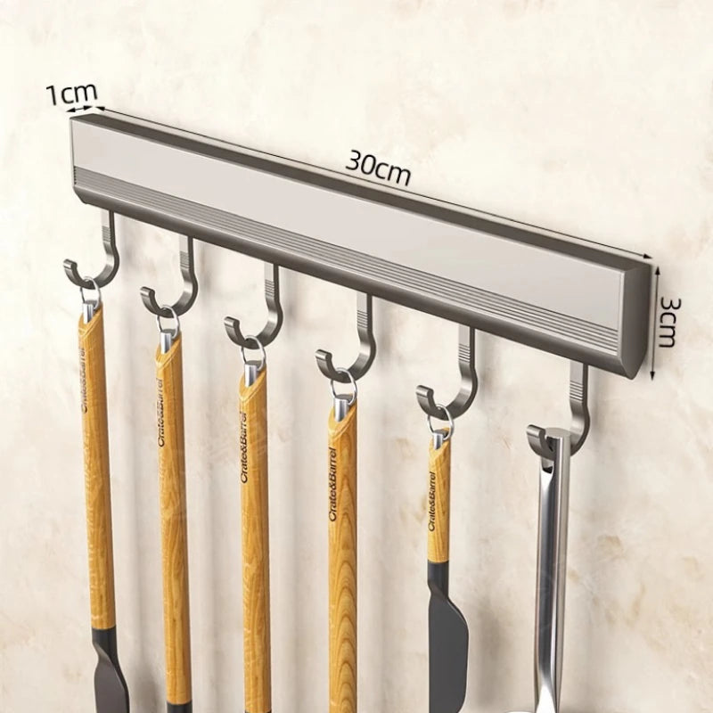 Zwevend haakrek voor keukengerei – stevige wandoplossing met stijlvolle afwerking in aluminiumlook.
